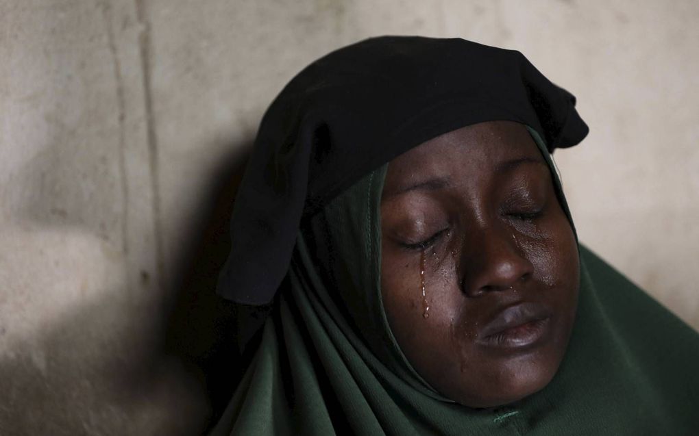 Moeder van twee scholieren uit de Nigeriaanse plaats Jangebe, een dag na hun ontvoering op vrijdag. Inmiddels zijn ze weer vrij. beeld AFP, Kola Sulaimon