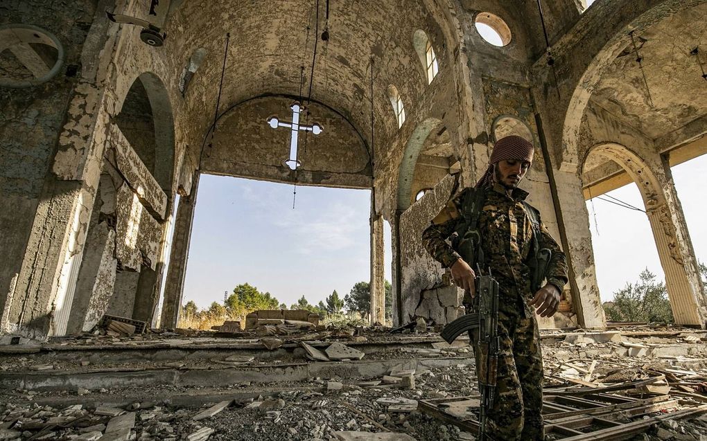 De Assyrische kerk in het dorp Tal Nasri in Syrië, verwoest door strijders van Islamitische Staat in 2019. beeld AFP, Delil Souleiman