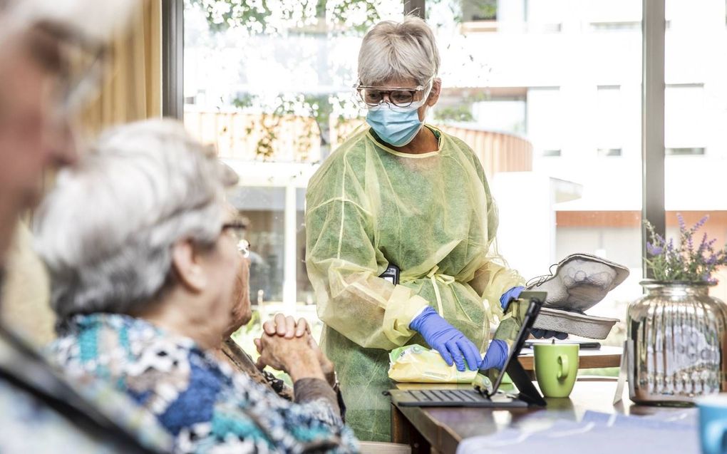 „Niet alles is de verantwoordelijkheid van de zorgverlener. Dat geeft ontspanning.​” beeld ANP, Jeffrey Groeneweg