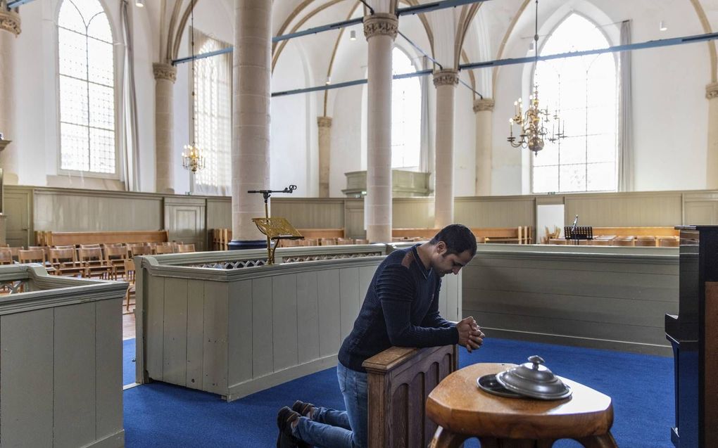De Iraanse asielzoeker Radin is in 2019 in de Broederkerk in Kampen gedoopt. beeld RD, Henk Visscher