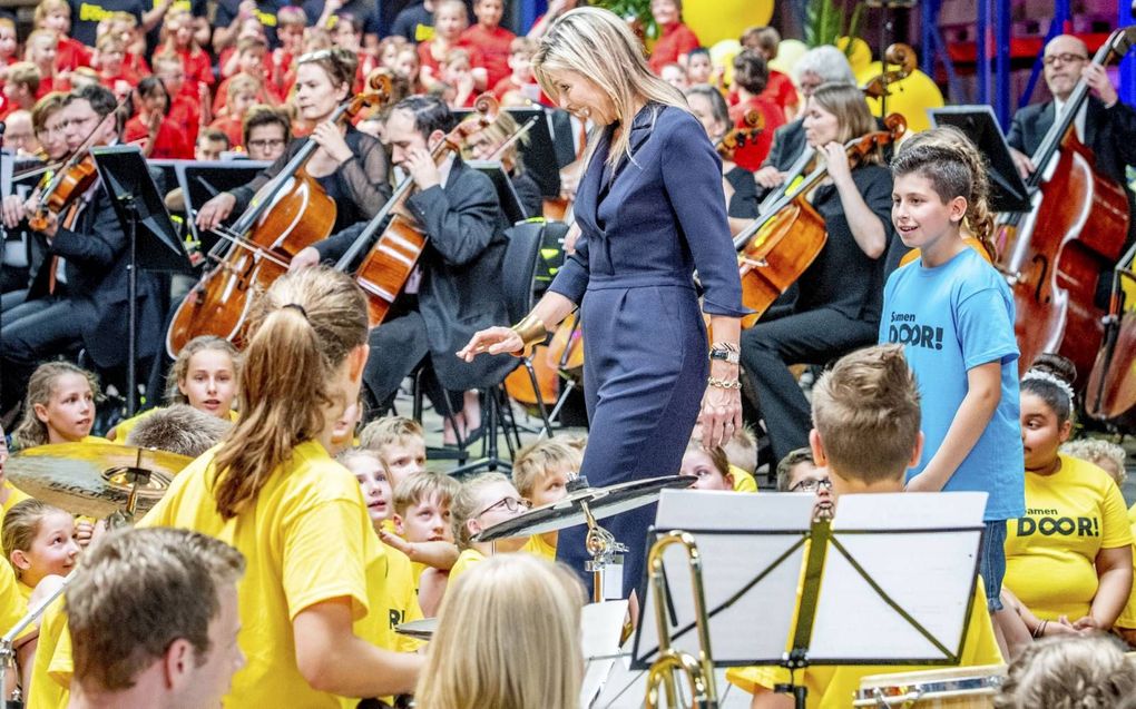 Koningin Maxima in 2018 in Ittervoort (Midden-Limburg) bij de ondertekening van een convenant voor beter muziekonderwijs. beeld ANP, Robin Utrecht