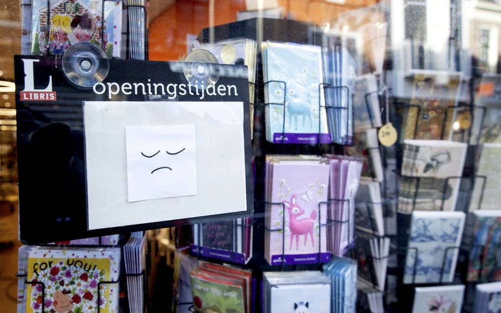 Een gesloten boekhandel in Alkmaar tijdens de tweede lockdown.  beeld ANP, Koen van Weel​