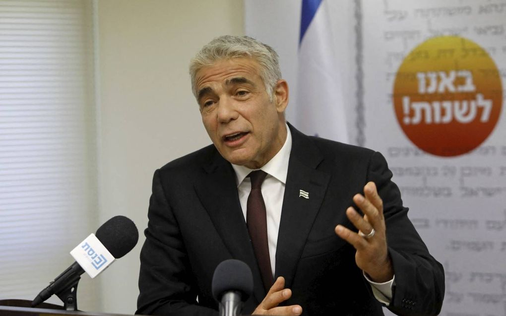 „Yair Lapid wist acht zeer verschillende partijen te smeden tot een grote coalitie.” beeld AFP, Gil Cohen-Magen