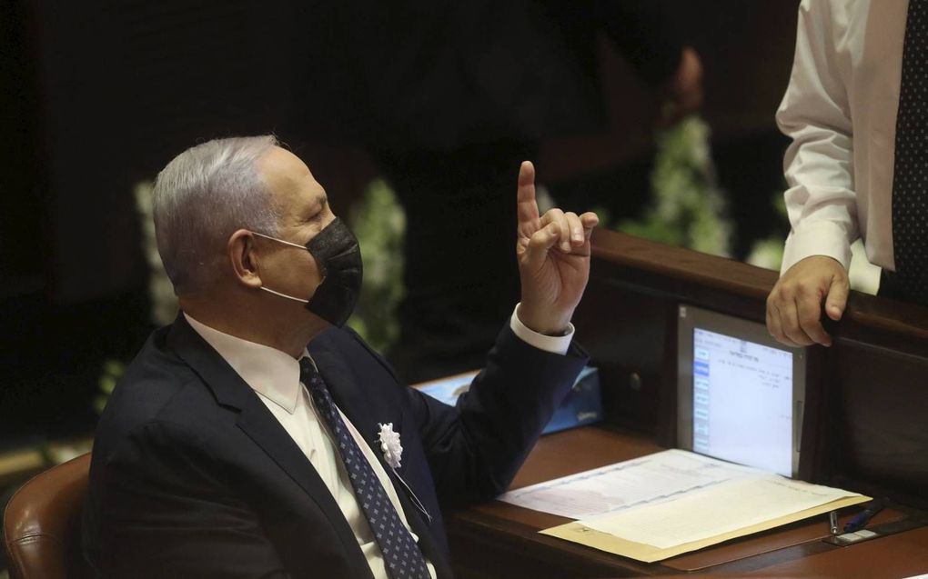 Netanyahu in de Knesset. beeld AFP, Gil Cohen-Magen