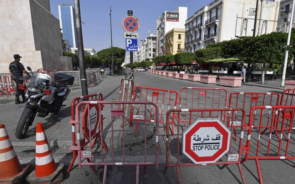 Wegversperring in Tunis. beeld AFP, Fethi Belaid