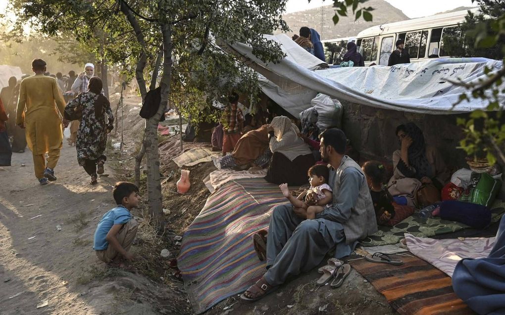 Afghaanse gezinnen vluchten naar hoofdstad Kabul, in de hoop dat het daar langer veilig is. beeld AFP, Wakil Hohsar