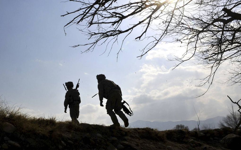 Amerikaanse soldaten op patrouille in het oosten van Afghanistan, februari 2010. beeld AFP, Kim Jae-Hwan