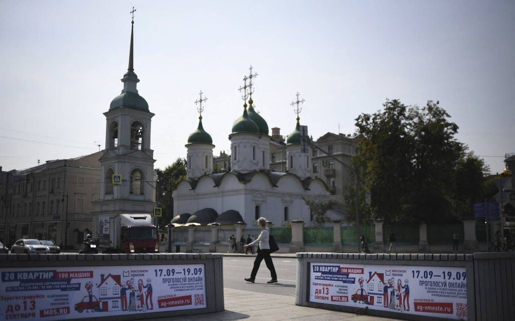 Oproep om te gaan stemmen in Moskou. Rusland kiest tussen 17 tot en met 19 september 450 afgevaardigden in de Doema. beeld AFP, Natalia Kolesnikova