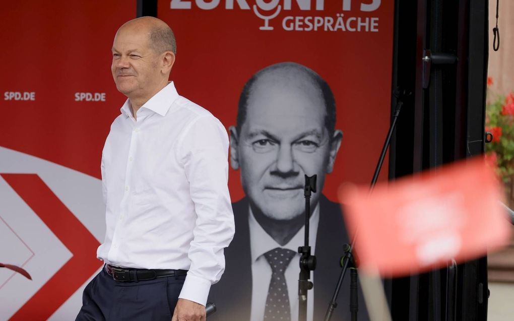 SPD-kandidaat voor het bondskanselierschap Olaf Scholz tijdens een verkiezingsbijeenkomst. beeld EPA, Ronald Wittek