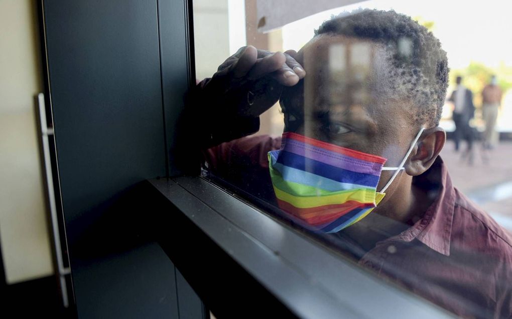 Een activist in afwachting van het vonnis van het Botswaanse hof van Beroep, maandag. beeld AFP, Monirul Bhuiyan