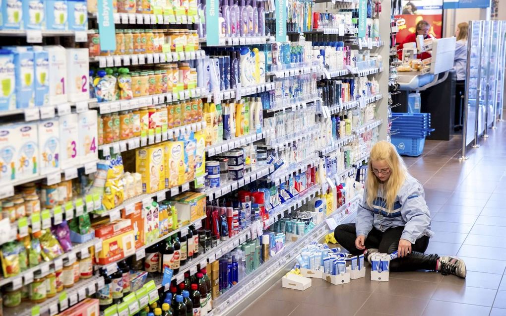 In sommige branches moet er tijdens de kerstdagen sowieso worden doorgewerkt, zoals in de supermarkt. beeld ANP, Jerry Lampen