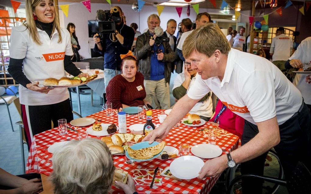 „Ook onze koning en koningin geven het goede voorbeeld met NLdoet.” beeld ANP, Patrick van Katwijk