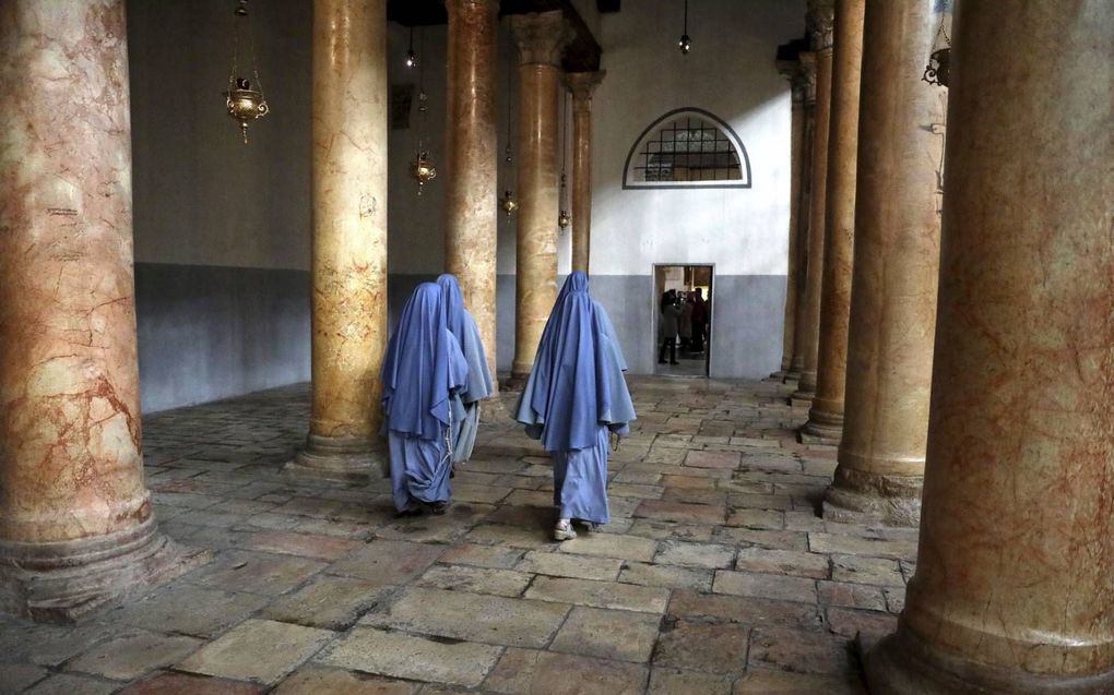 De Bethlehemkerk in Bethlehem, gebouwd op de plaats waar Christus zou zijn geboren. beeld AFP