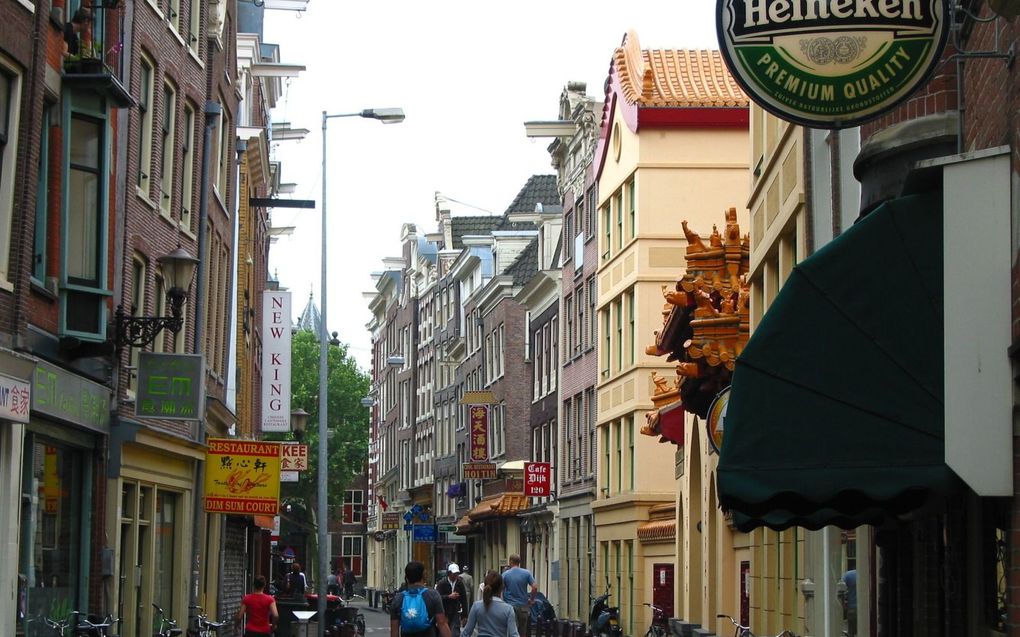 Landen met een aanzienlijke Chinese gemeenschap merken heel wat meer van geld en invloed vanuit Peking dan Nederland. Foto: Chinatown in Amsterdam. beeld Wikimedia