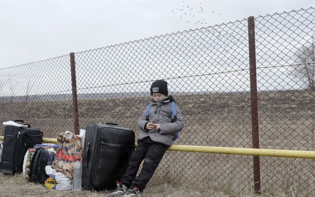 Van huis en haard verdreven. beeld EPA, Robert Ghement