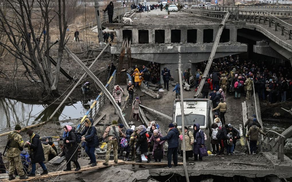 „Net als eerder in Tsjetsjenië en Syrië wordt de tactiek van de verschroeide aarde toegepast om burgers te verdrijven.” beeld AFP, Aris Messinis