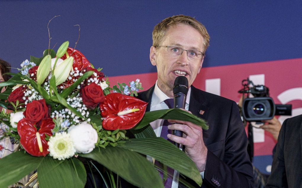 Premier Daniel Günther na zijn overwinning. beeld AFP, Axel Heimken