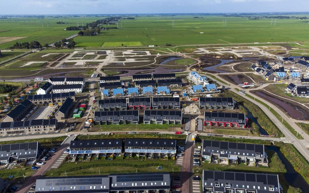 De Zwolse nieuwbouwwijk Stadshagen groeit gestaag het landbouwgebied in de Mastenbroekerpolder in.  beeld ANP, Vincent Jannink