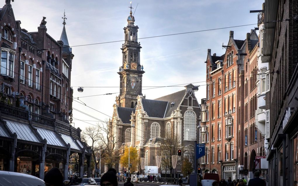 In de Westerkerk in Amsterdam komen veel toeristen. „De predikant is veel meer dan voorheen aanwezig in de kerk en krijgt daardoor allerlei pastorale vragen en gesprekken.” beeld RD, Henk Visscher