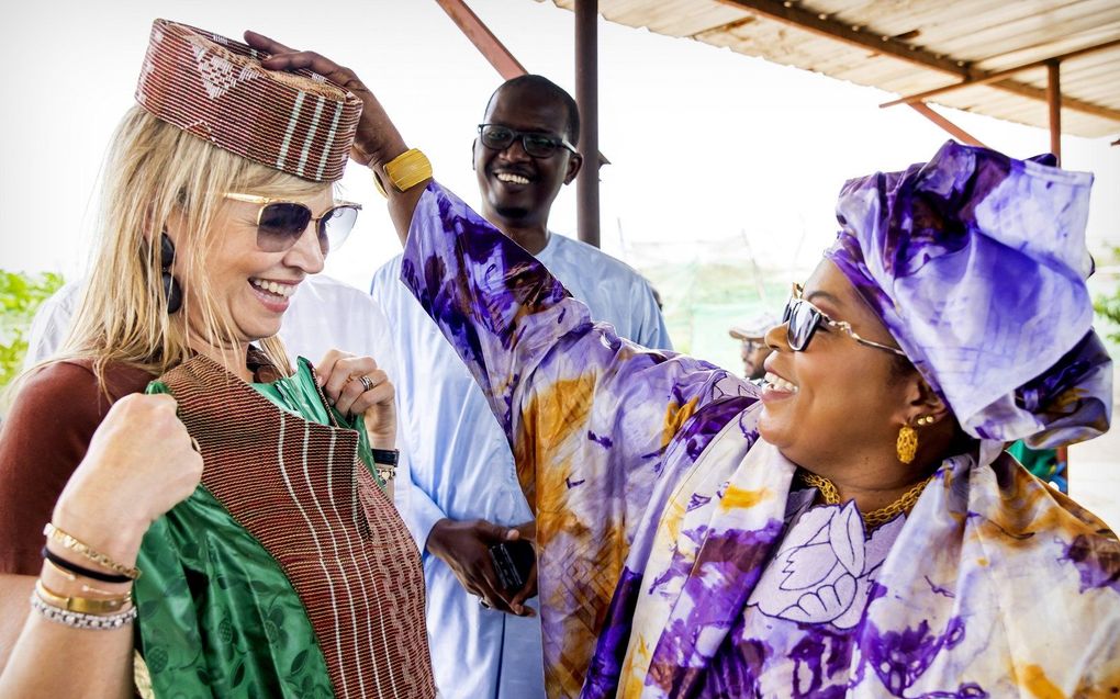 Koningin Maxima tijdens een bezoek aan verzekeringsbedrijf Compagnie Nationale DÕAssurance Agricole du Senegal. Maxima bracht na Ivoorkust een bezoek aan Senegal, in haar functie van speciale pleitbezorger van de secretaris-generaal van de Verenigde Naties (VN) voor inclusieve financiering voor ontwikkeling. beeld ANP, Koen van Weel