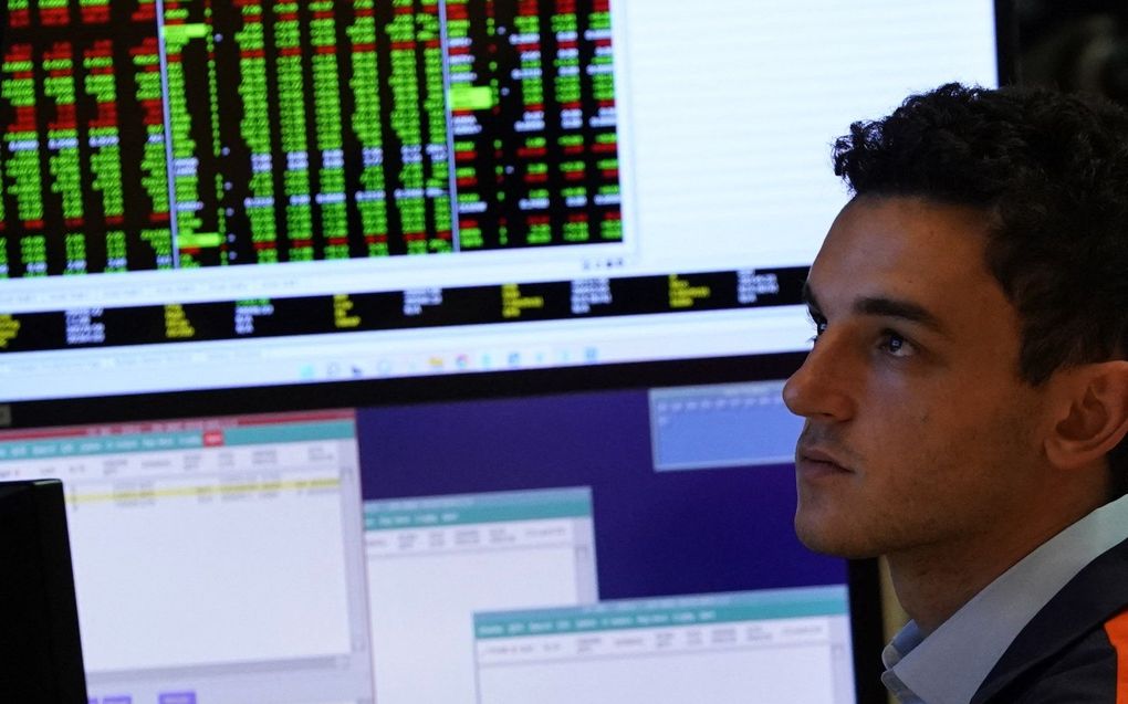 Handelaren werken op de vloer tijdens de openingsbel op de New York Stock Exchange in New York. De Amerikaanse Federal Reserve staat op het punt om de leenkosten op 15 juni te verhogen te midden van de verontrustende versnelling van de inflatie. beeld AFP, Timothy A. Clary