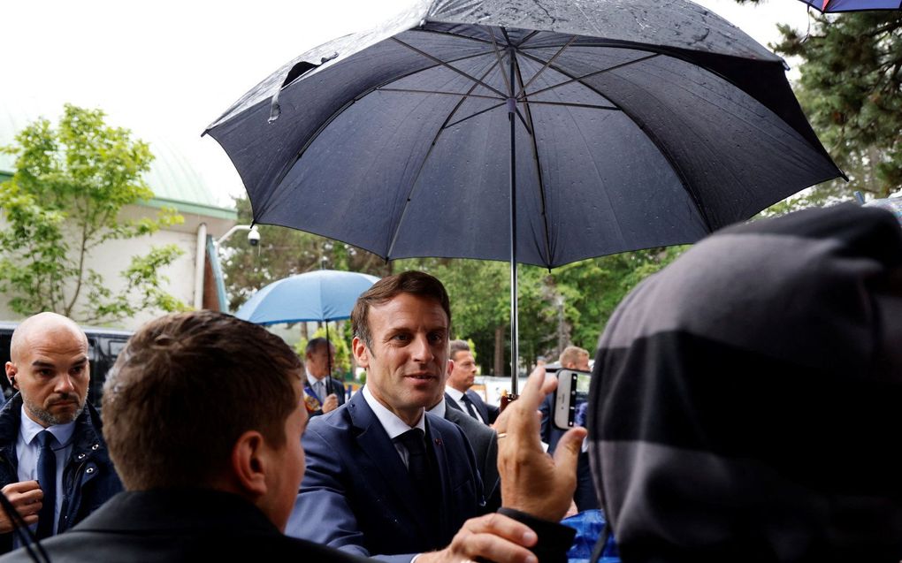 Macron nadat hij zijn stem uitbracht. beeld AFP, Ludovic MARIN