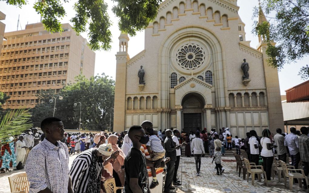 Rooms-katholieken tijdens een dienst bij de St. Matthew-kathedraal in de Sudanese hoofdstad Khartoem. beeld AFP, Ashraf Shazly