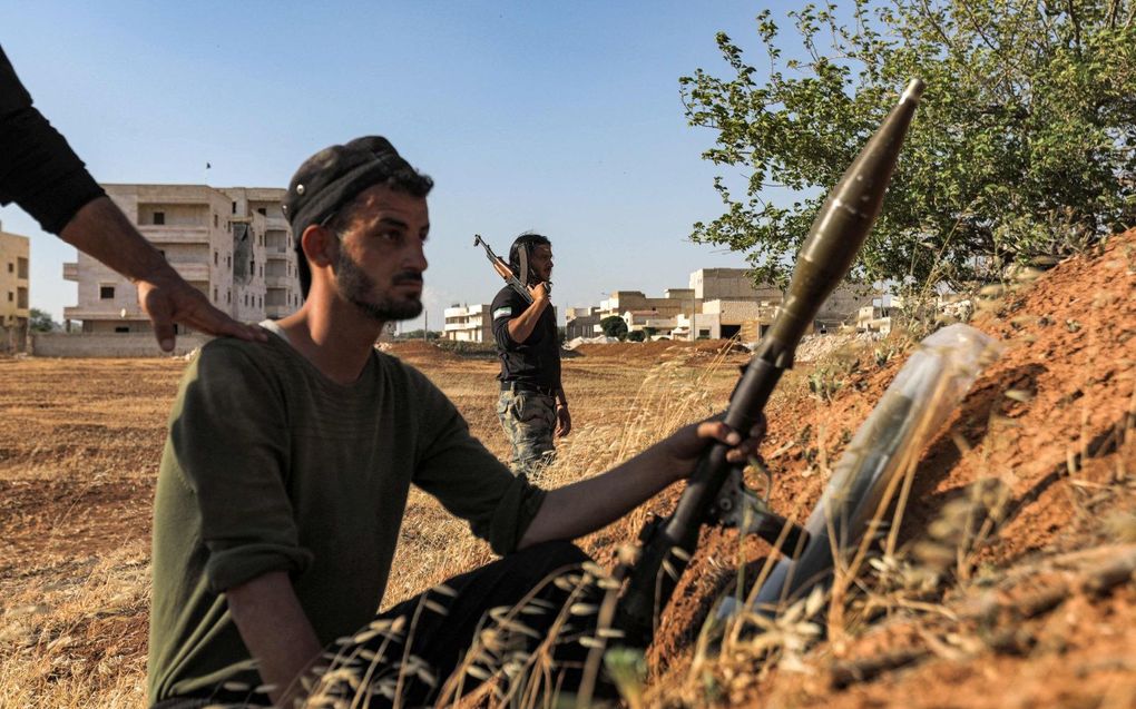 Pro-Turkse strijders in het grensgebied tussen Syrië en Turkije. beeld AFP
