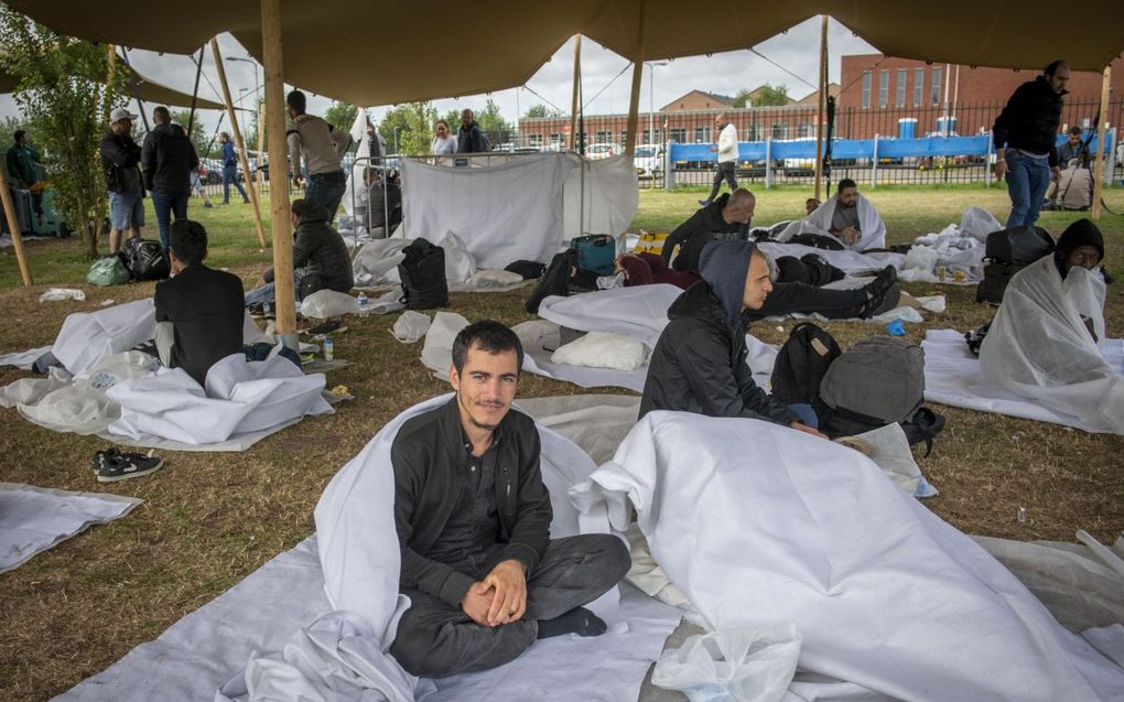 Asielzoekers bij het aanmeldcentrum in Ter Apel. beeld ANP, Sem van der Wal