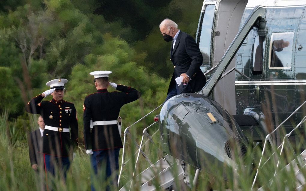 Biden reisde afgelopen weekend naar zijn vakantiehuis om te herstellen van corona. beeld AFP, SAUL LOEB