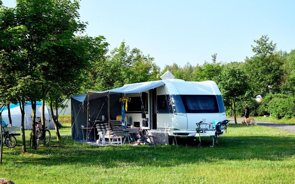 „In onze maatschappij lijkt vakantie pas echt van betekenis te zijn als je op vakantie gaat, prachtig weer hebt en bijzondere dingen doet.” beeld iStock