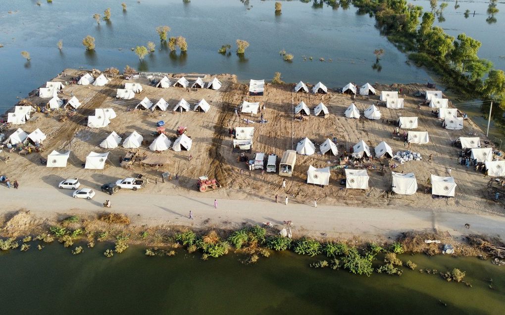 Tentenkamp voor mensen die op de vlucht moesten voor het water. beeld AFP, Fida HUSSAIN