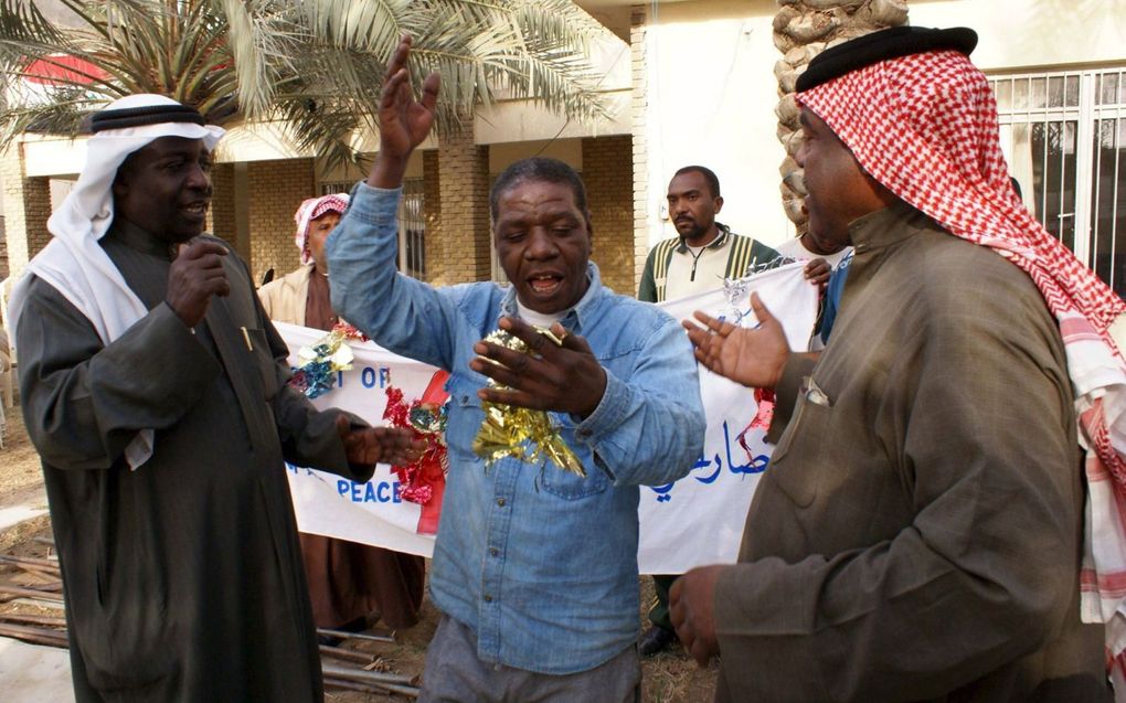 Afro-Irakezen vieren de inauguratie van Barack Obama als eerste zwarte president van de Verenigde Staten in januari 2009. beeld EPA, Haider al-Assadee