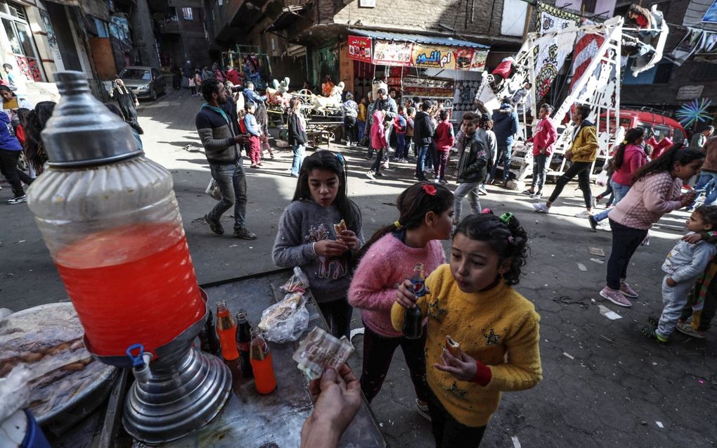 Kinderen in Caïro. beeld AFP, Mohamed al-Shahed