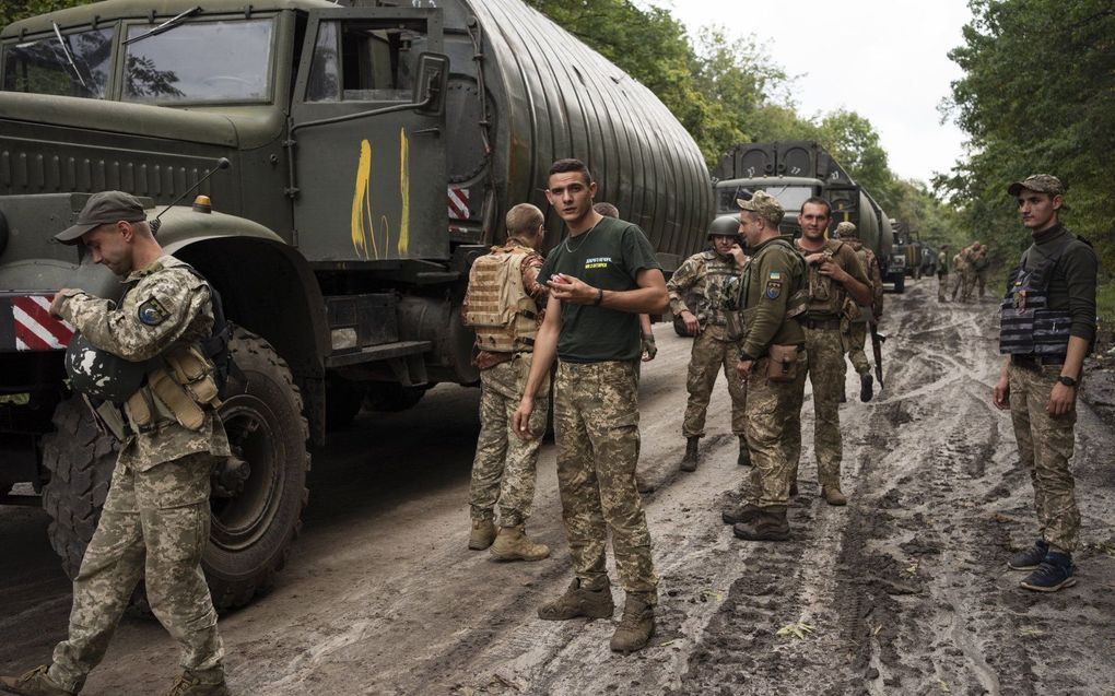 Oekraïense militairen in de omgeving van Charkov, zaterdag. beeld EPA, Anastasia Vlasova