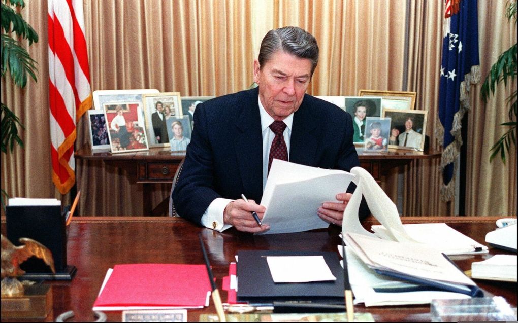 President Ronald Reagan, hier zittend ​in the Oval Office van het Witte Huis, wilde begin jaren tachtig een nieuw aan te leggen pijplijn van Rusland naar West-Europa voorkomen. beeld AFP, Mike Sargent