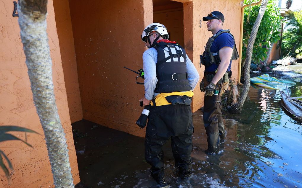 Boven land in Florida verloor Ian aan kracht en raasde verder als een tropische storm. Foto: Fort Myers, Florida. beeld AFP, Joe Raedle