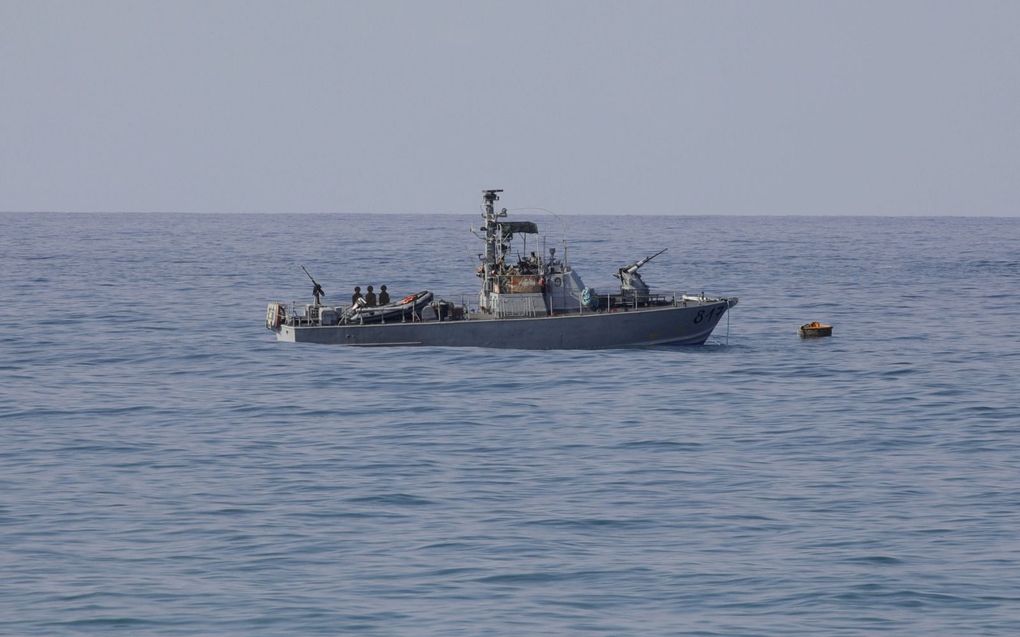 Israëlisch marineschip in de wateren tussen Libanon en Israël, vrijdag. beeld AFP, Jalaa Marey