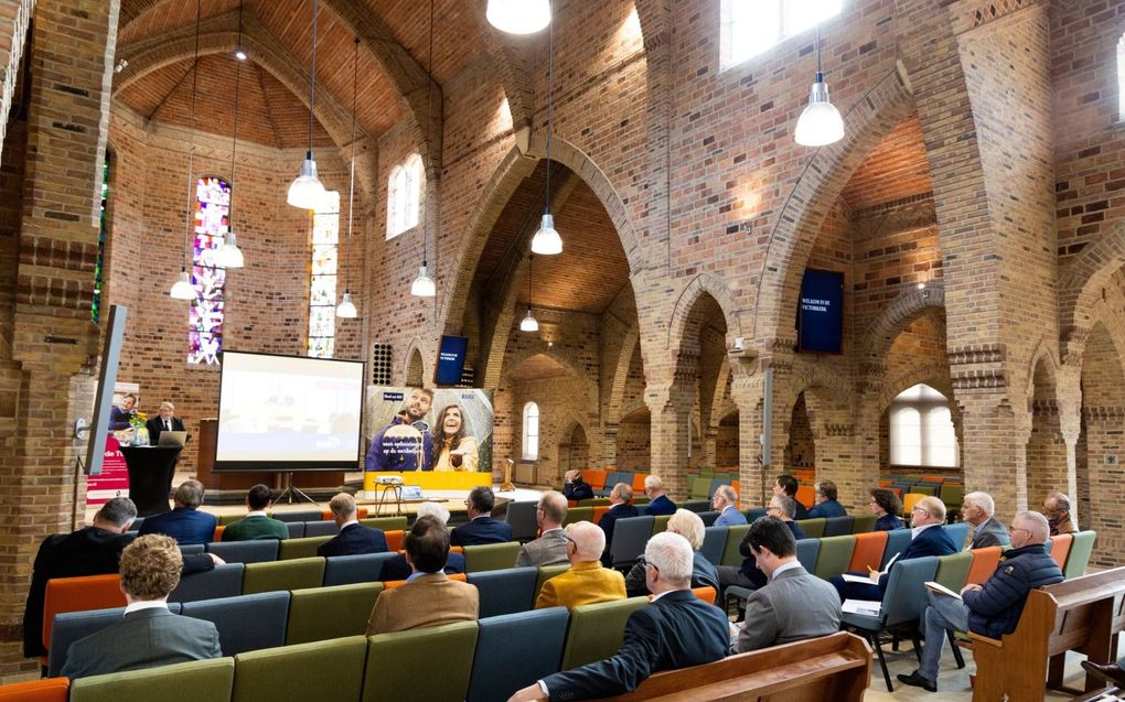 Het symposium vond plaats in de Victorkerk in Apeldoorn. beeld Anton Dommerholt