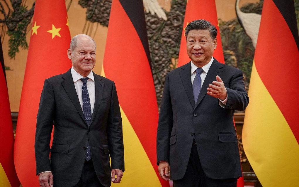 Olaf Scholz (l.) en Xi Jingping. beeld AFP, Kay Nietfeld