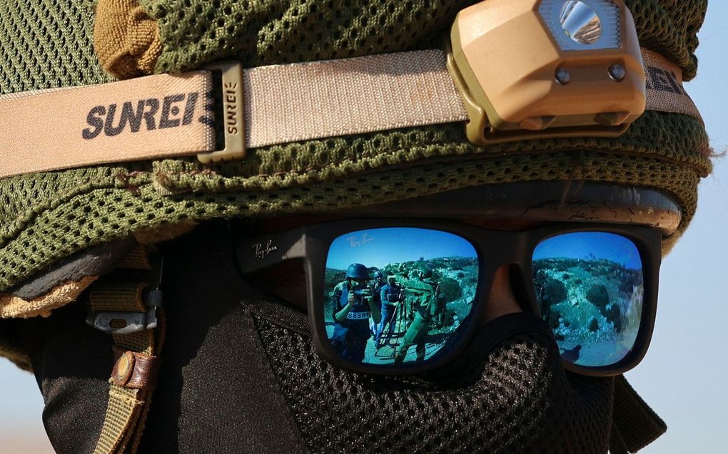 Een lid van de Israëlische veiligheidsdienst tijdens een protest van Palestijnen in Beit Dajan, ten oosten van de stad Nablus op de Westelijke Jordaanoever. beeld AFP, Zain Jaafar