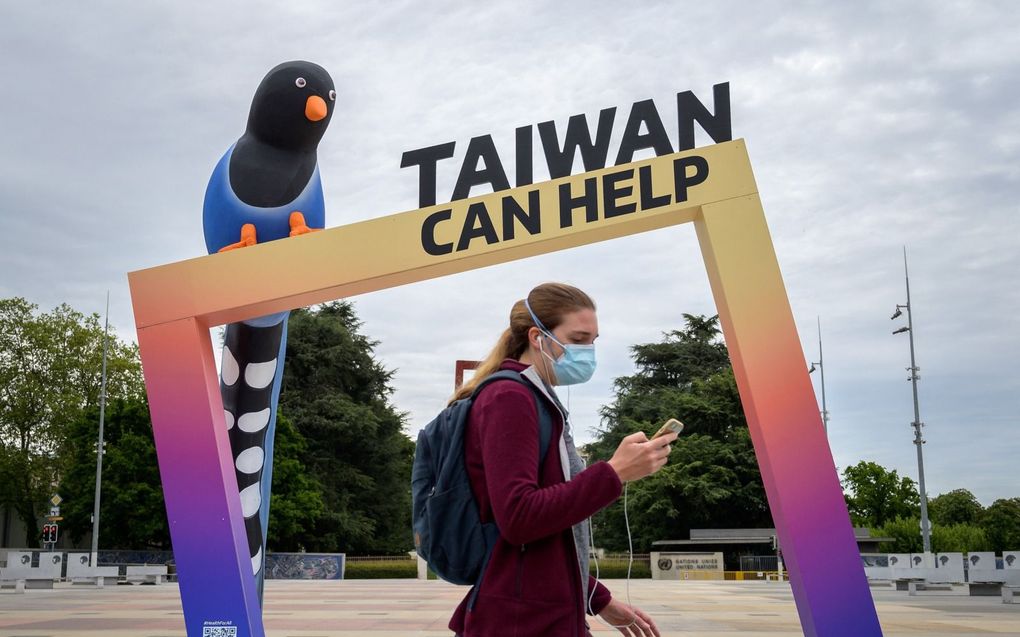 Taiwanees protest tegen uitsluiting van de WHO-vergadering in 2021 in Genève. beeld AFP, Fabrice Coffrini