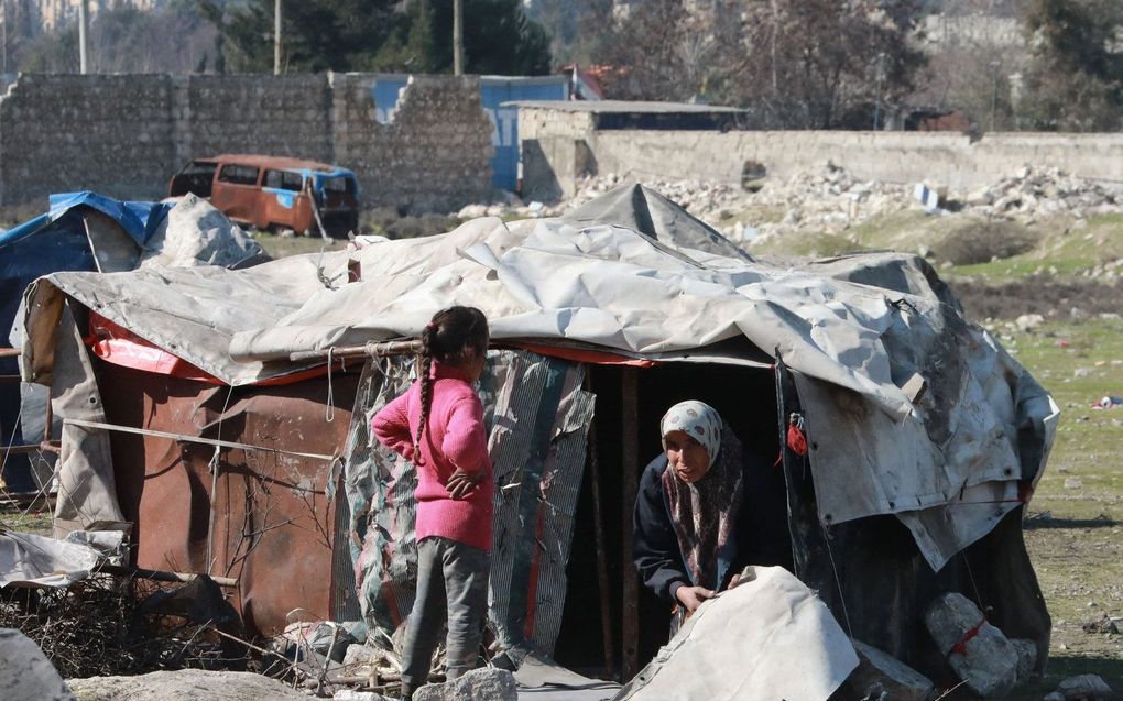 Voor Syrië komen de brokstukken van de aardbeving boven op de puinhopen van de oorlog. beeld AFP, Louai Beshara