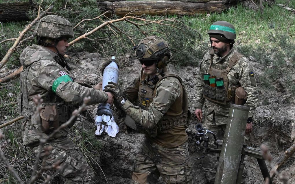 Oekraïense soldaten in de frontlinie in de regio Donetsk. beeld AFP, Genya Savilov