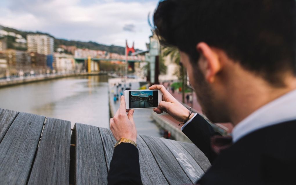 Bijna iedereen gebruikt de smartphone voor het schieten van leuke plaatjes, familiefoto’s en vakantiekiekjes. beeld iStock