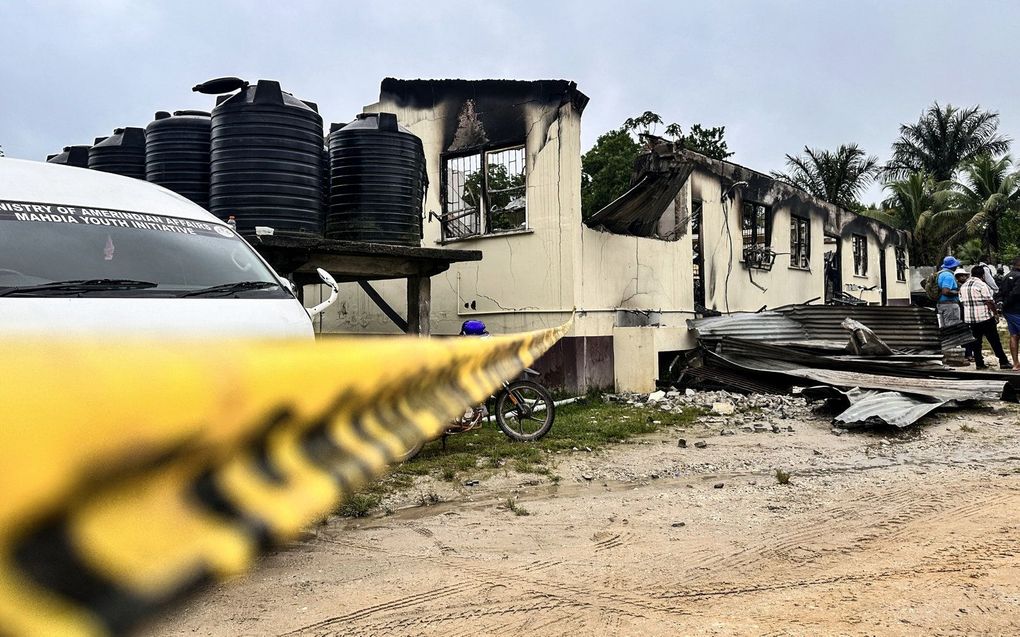 Beelden van de school in Guyana na de dodelijke brand. beeld AFP, Keno George