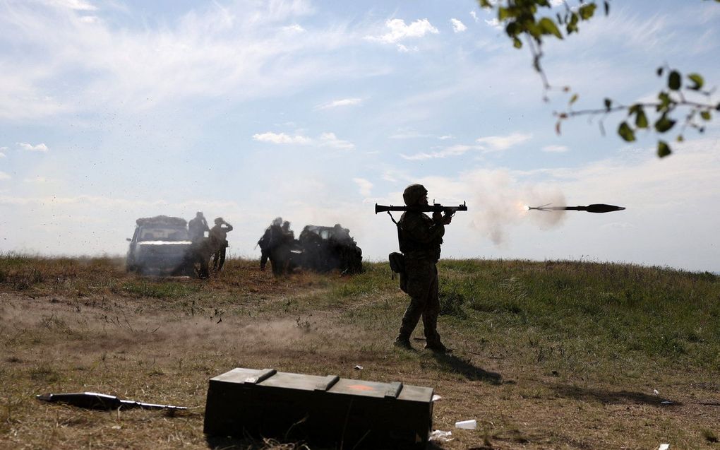 Oekraïense militairen tijdens een training. beeld AFP, Anatolii Stepanov