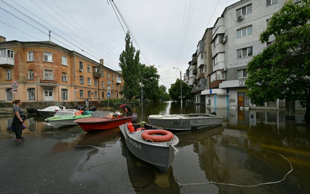 Bootjes in de straten van Kherson. Beeld AFP, Genya SAVILOV