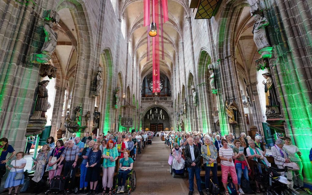 Bezoekers van de Kirchentag in Neurenberg. De preek van de Duitse predikant Quinton Ceasar zorgt voor veel ophef. epd-bild/Friedrich Stark