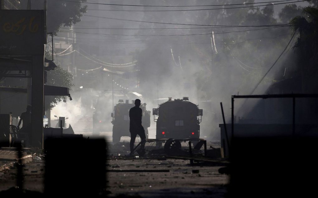 Israëlische troepen in gevecht met Palestijnse terroristen in Jenin. beeld EPA, Alla Badarneh